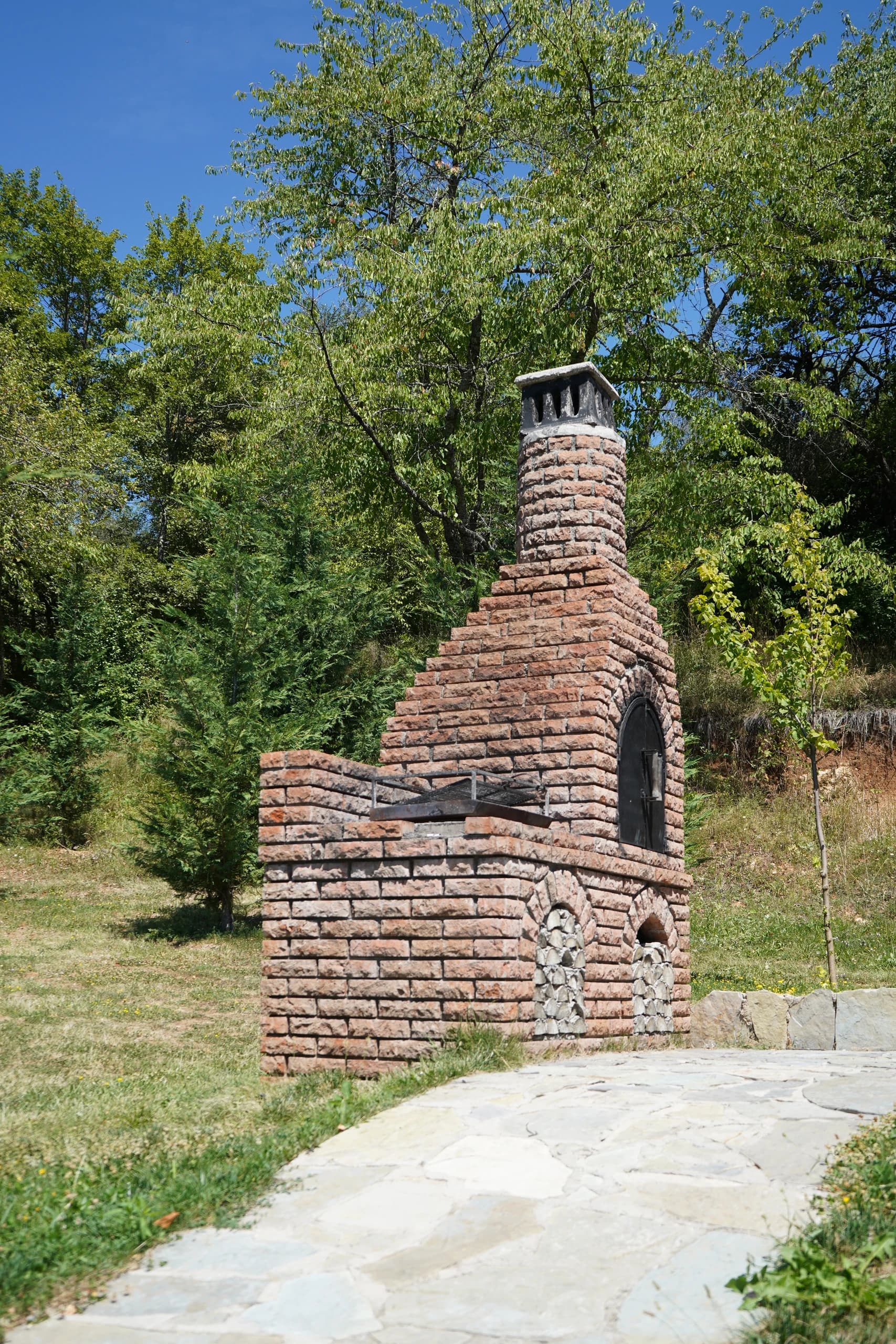 The outdoor fireplace where dinners begin