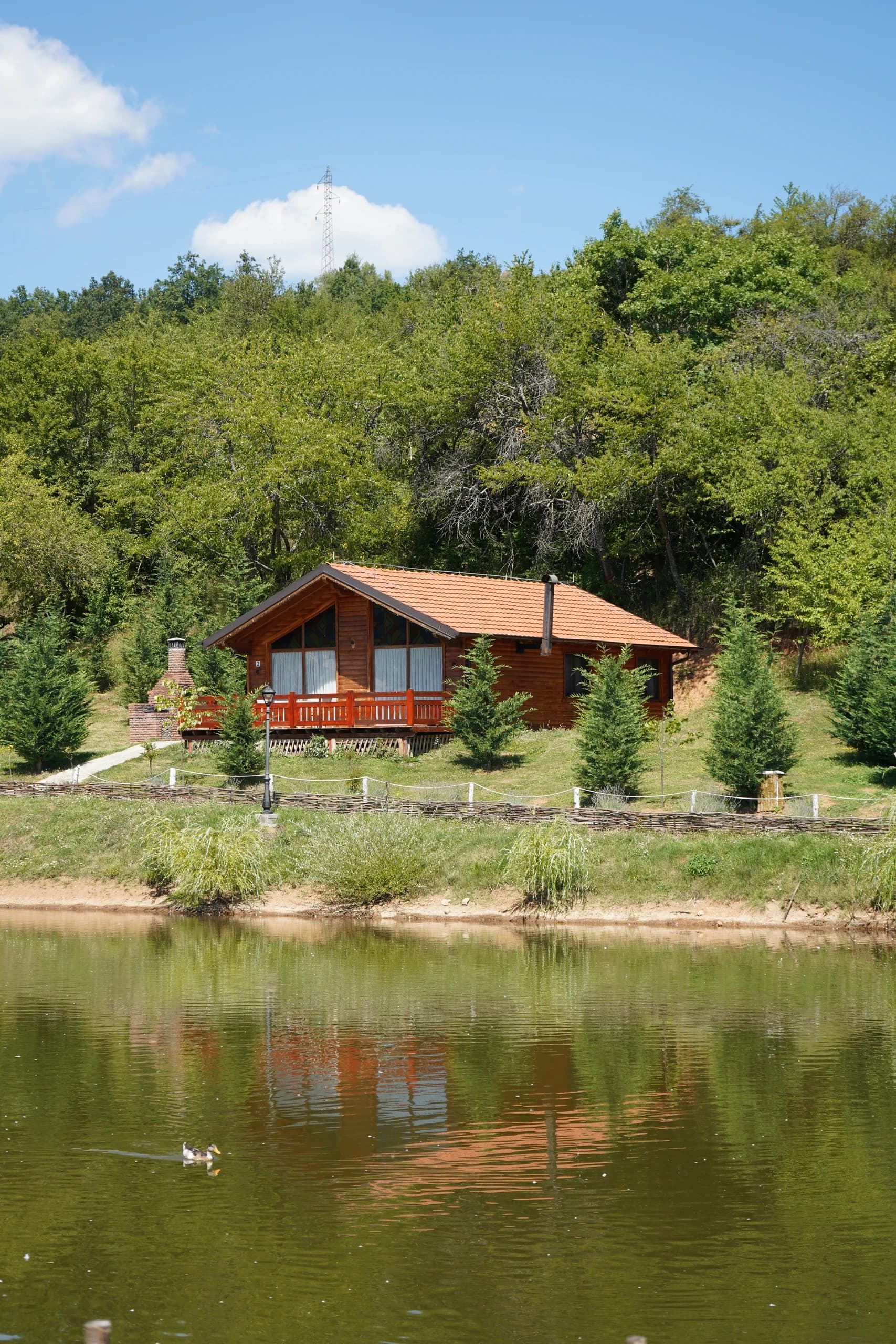 A villa mirrored in the still water